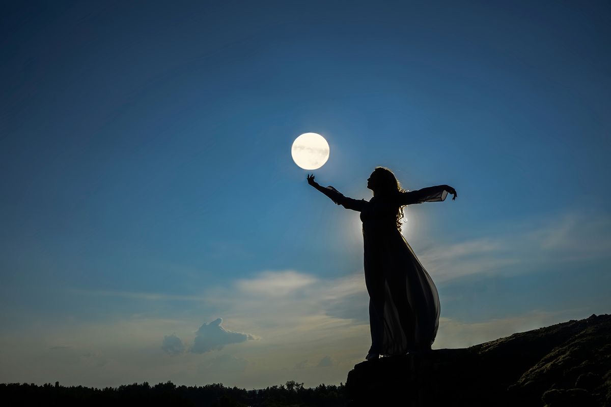 Silhoutee,Of,Woman,Standing,On,Top,Of,Mountain.,Female,Hold