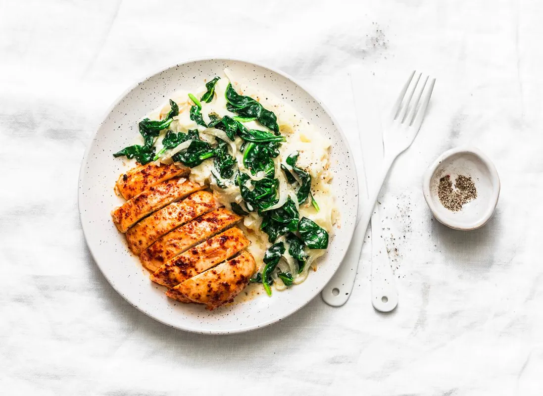 Baked,Chicken,Breast,,Mashed,Potatoes,With,Creamy,Spinach,On,A