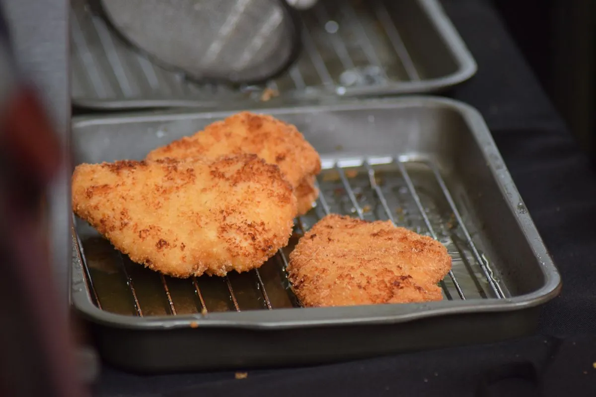 Close,Up,Of,Crispy,Weiner,Schnitzel,On,A,Hot,Oven