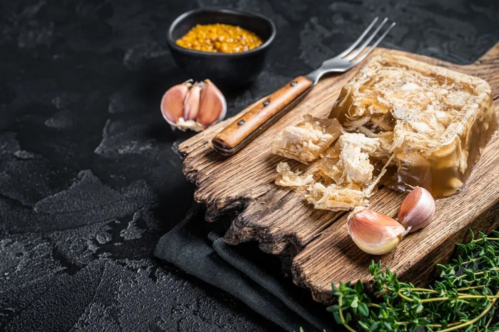 Aspic,With,Chicken,Meat,On,Wooden,Board.,Black,Background.,Top