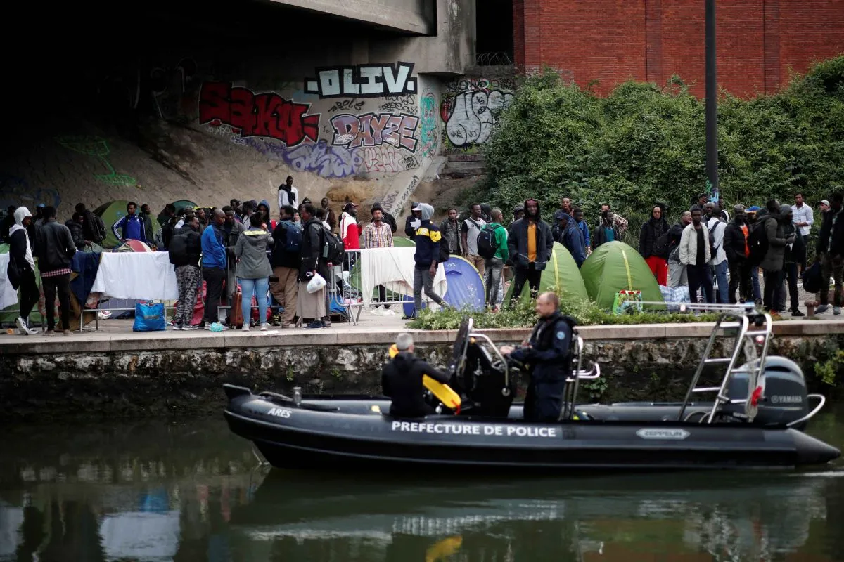 French police evacuate hundreds of migrants living in makeshift camps in Paris