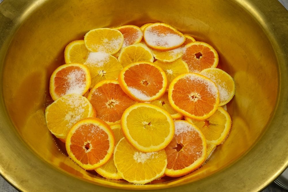 Orange,Slices,Sprinkled,With,Sugar,Lie,In,Layers,In,A