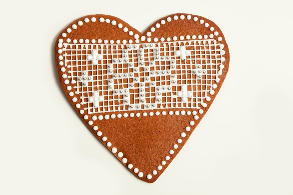 Heart,Shaped,Gingerbread,With,Hand,Made,Decoration,Of,Icing,Made