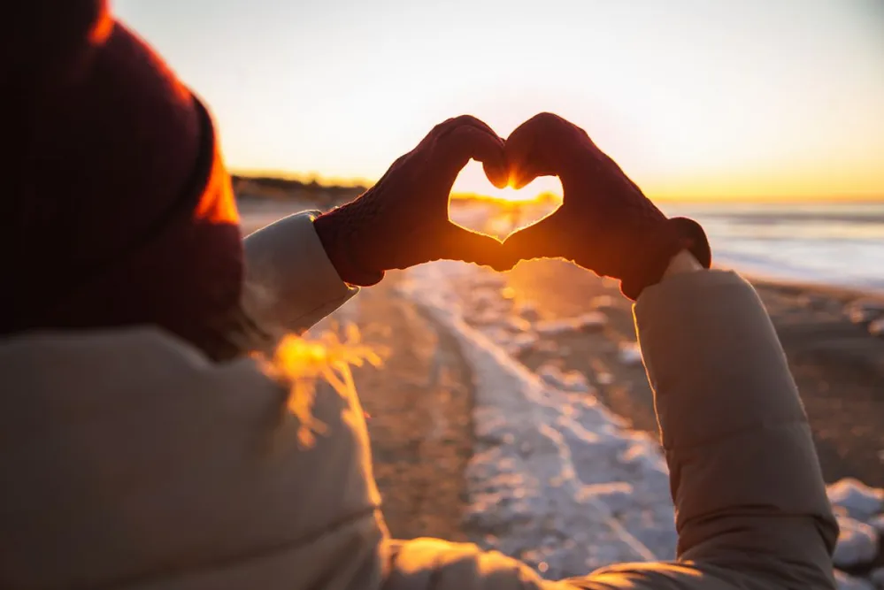 Woman,Hands,In,Red,Winter,Gloves,Heart,Symbol,Shaped,Lifestyle,
