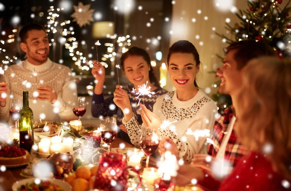 Winter,Holidays,And,People,Concept,-,Happy,Friends,With,Sparklers