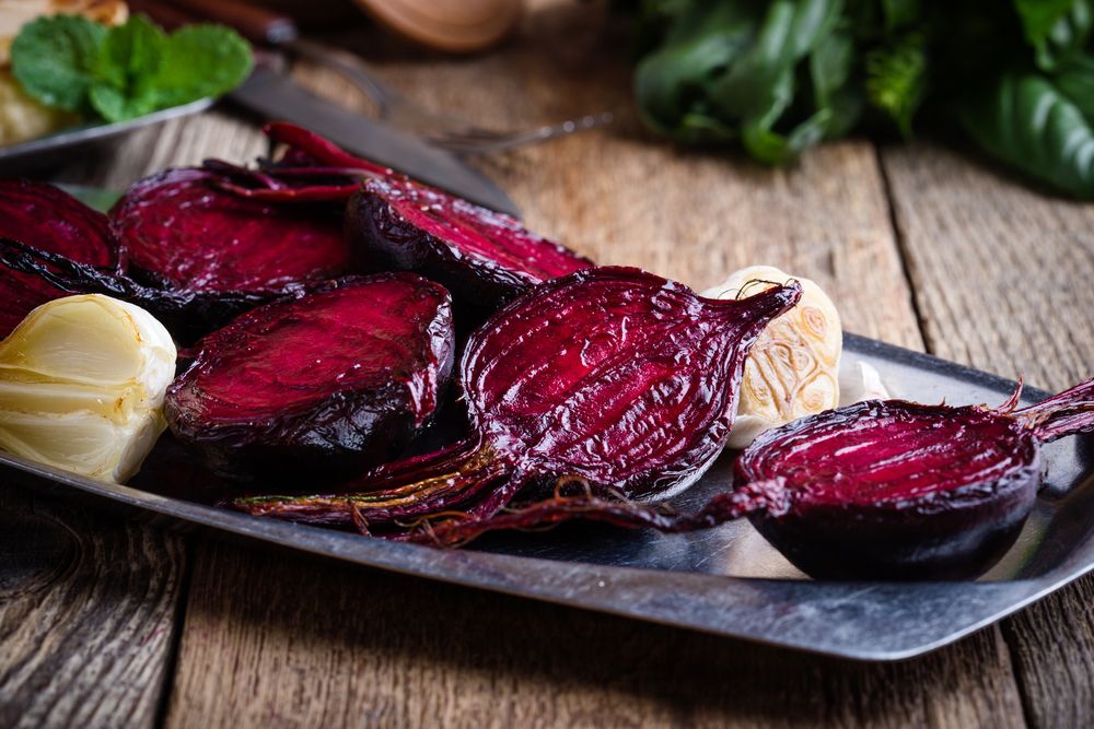 Sliced,Baked,Beetroot,On,Rustic,Outdoor,Party,Table,,Diet,And