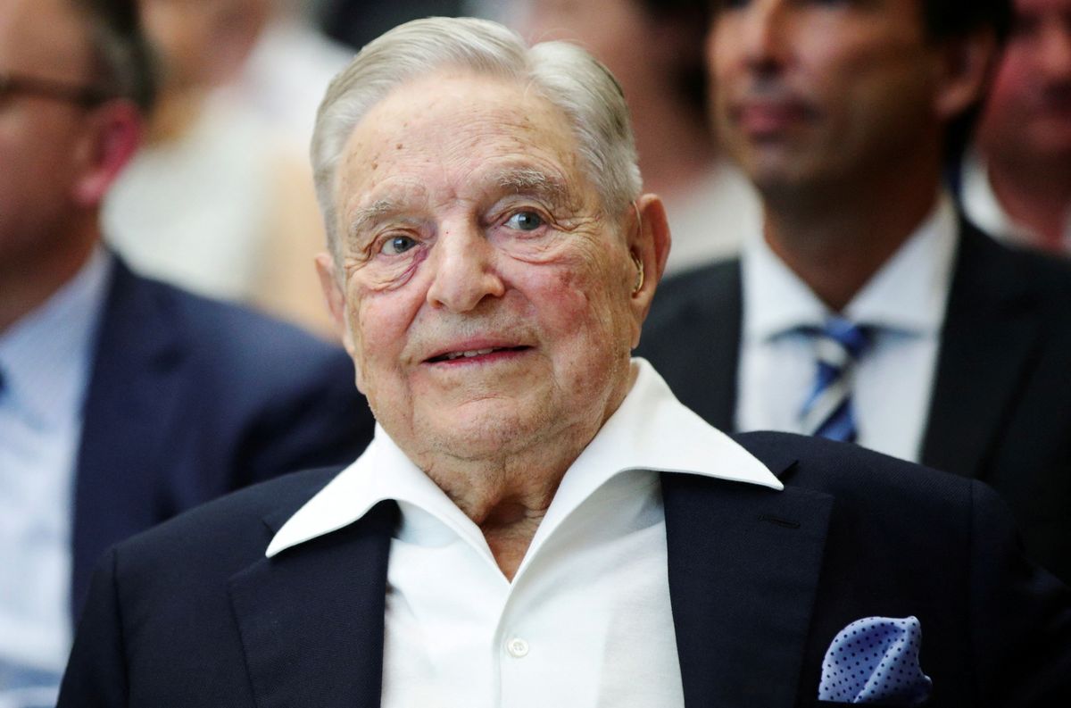 FILE PHOTO: Billionaire investor George Soros is awarded the Schumpeter Prize, an Austrian award for achievement in economics and politics, in Vienna, where the Central European University he funds is opening a new campus after being forced out of his nati