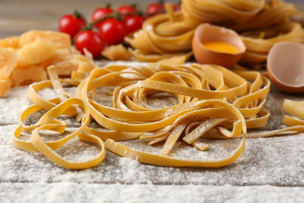 Still,Life,With,Raw,Homemade,Pasta,And,Ingredients,For,Pasta