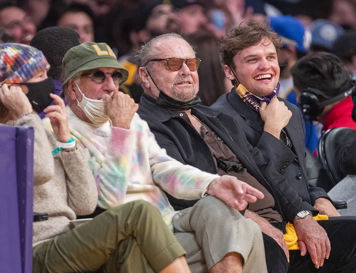Celebrities attend the Los Angeles Lakers play the Golden State Warriors during the season opener