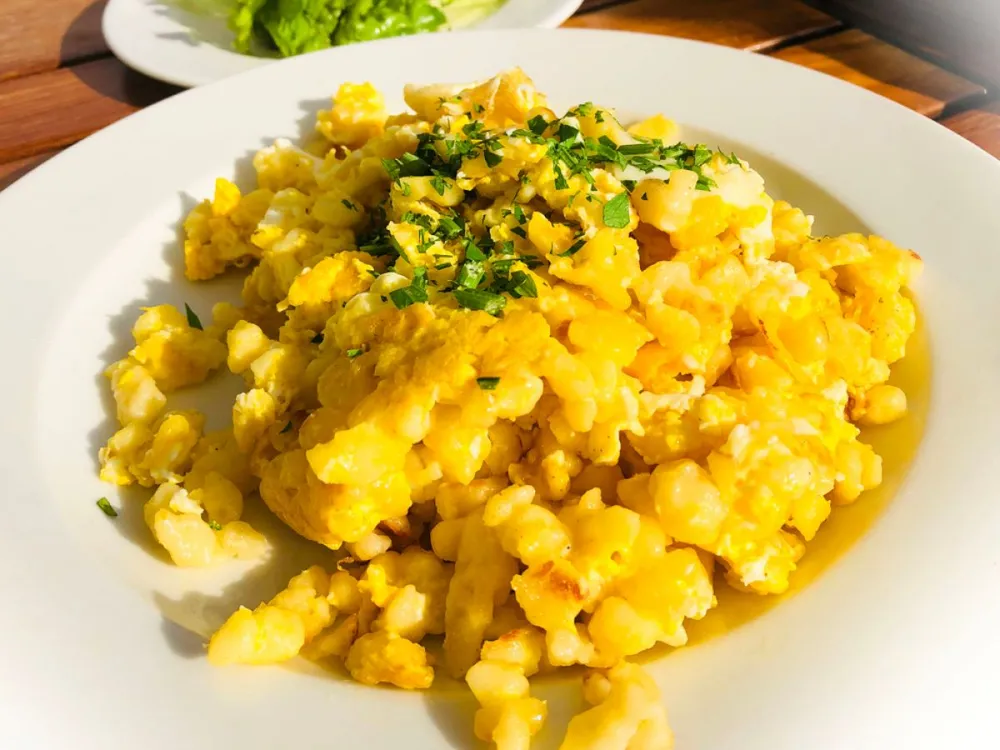 Vegetarian,Austrian,Popular,Dish,Egg,Dumplings,With,Salad.,"eiernockerl".