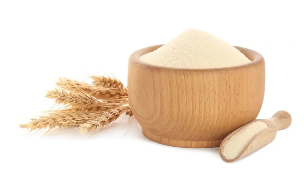 Semolina,In,Wooden,Bowl,And,Scoop,On,White,Background