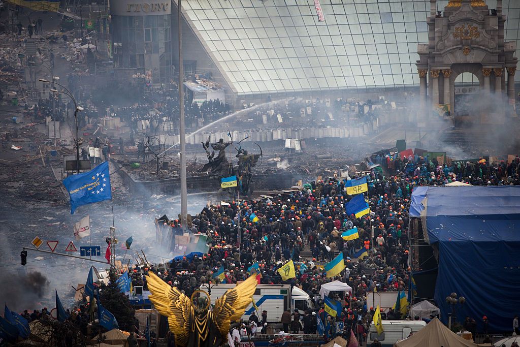 Anti-government protesters clash with the police in Kiev