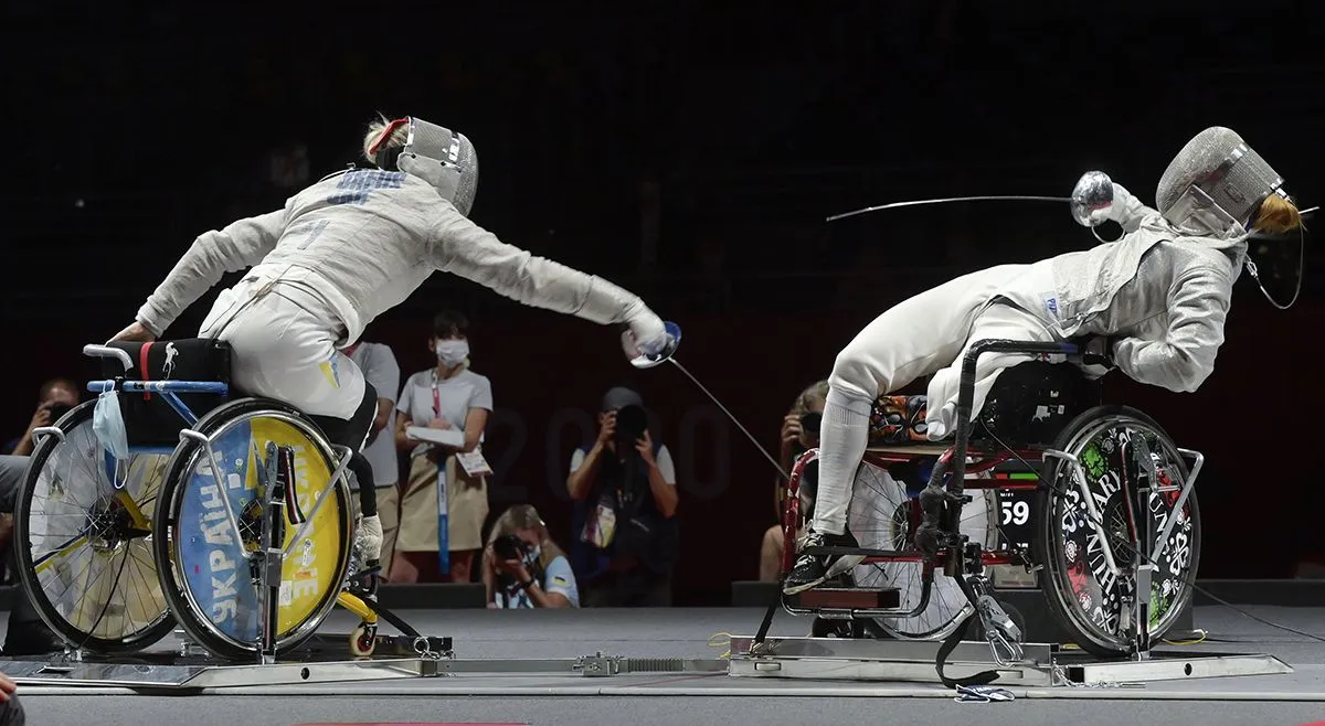 HAJMÁSI Éva; Breusz, Jevhenilija