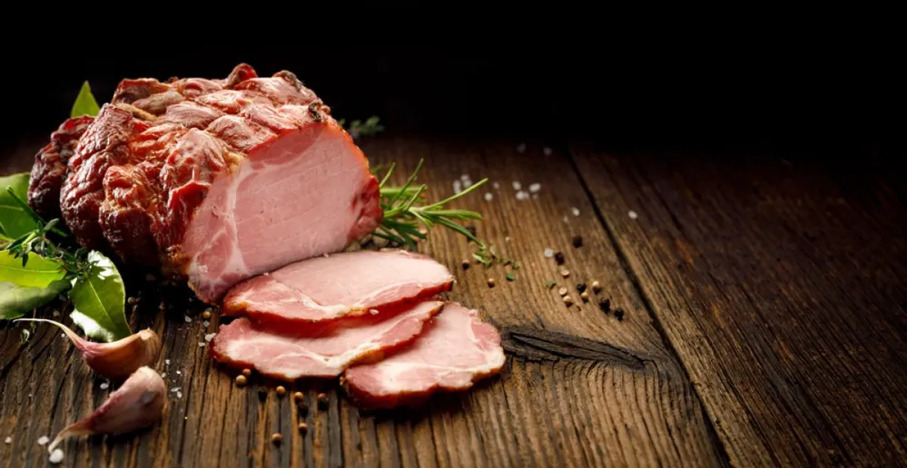 Sliced,Smoked,Gammon,On,A,Wooden,Table,With,Addition,Of