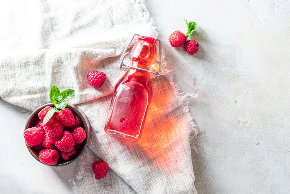 Homemade,Raspberry,Vinegar,And,Fresh,Raspberries.,Flat,Lay,For,Your