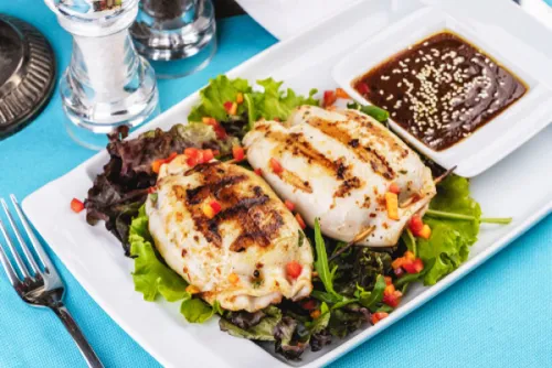 European,Cuisine,,Mediterranean,Dish.,Stuffed,Squid,On,A,Leaf,Of