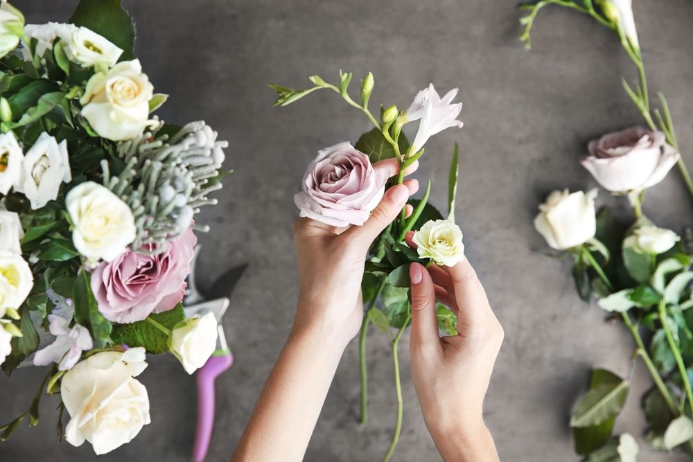 Female,Florist,Making,Beautiful,Bouquet,At,Flower,Shop
