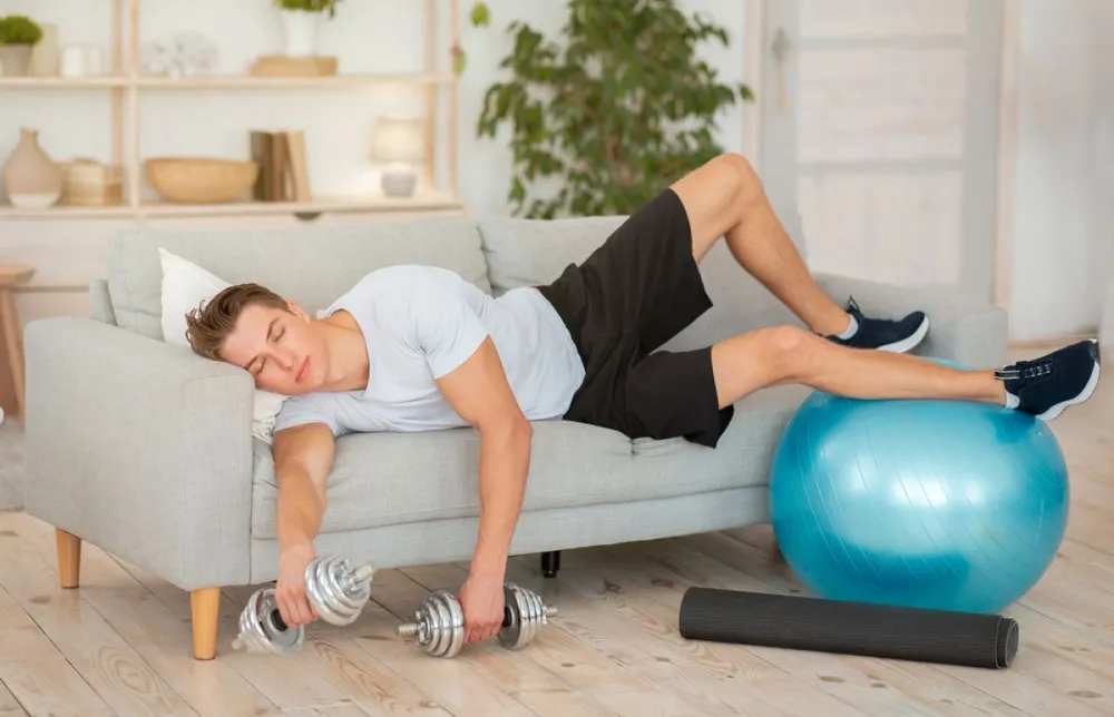 Fatigue,After,Active,Hard,Training.,Tired,Guy,With,Dumbbells,And