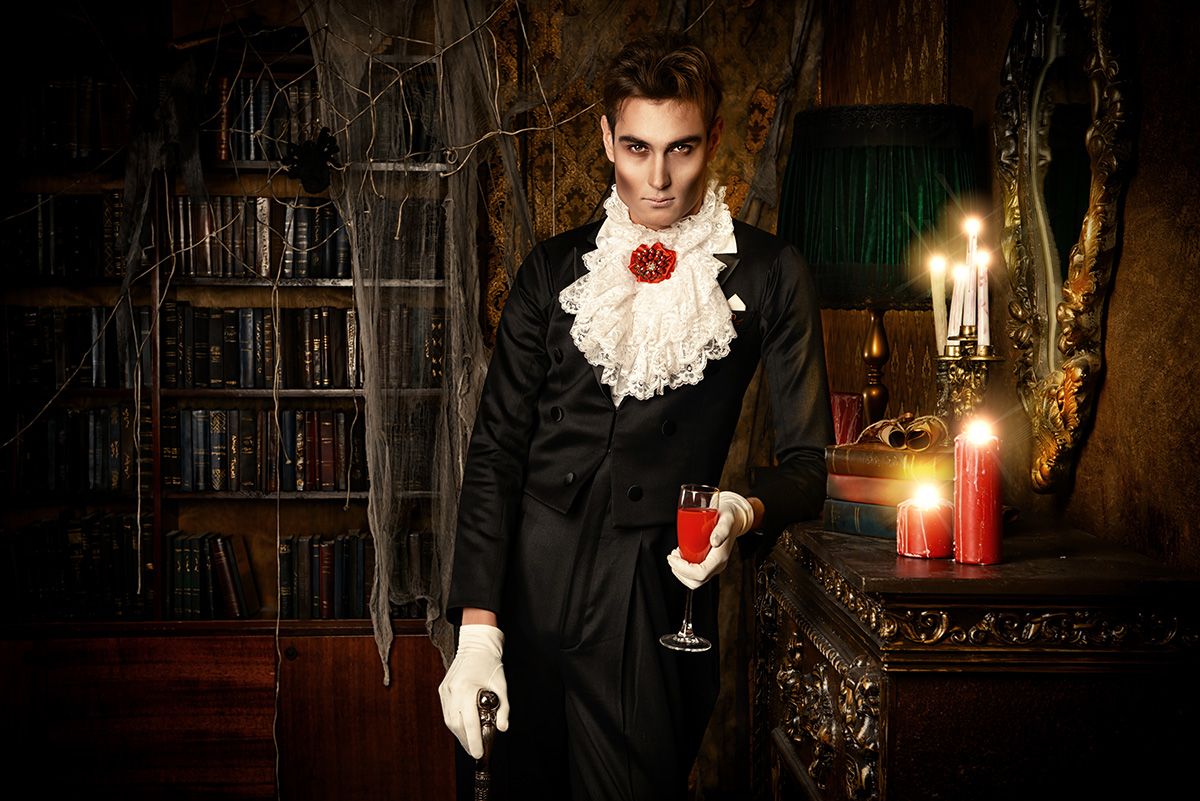 Handsome,Vampire,Man,Wearing,Elegant,Tailcoat,Stands,In,The,Old