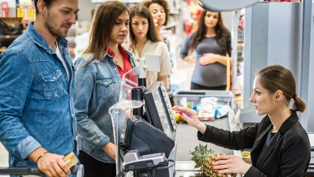 People,Buying,Goods,In,A,Grocery,Store