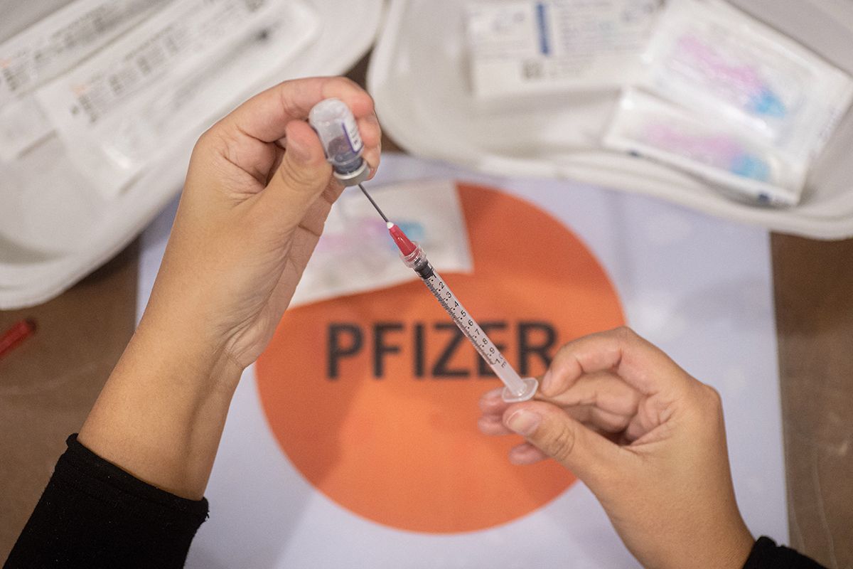 GGD Healthcare Workers Prepare The Pfizer COVID-19 Vaccine