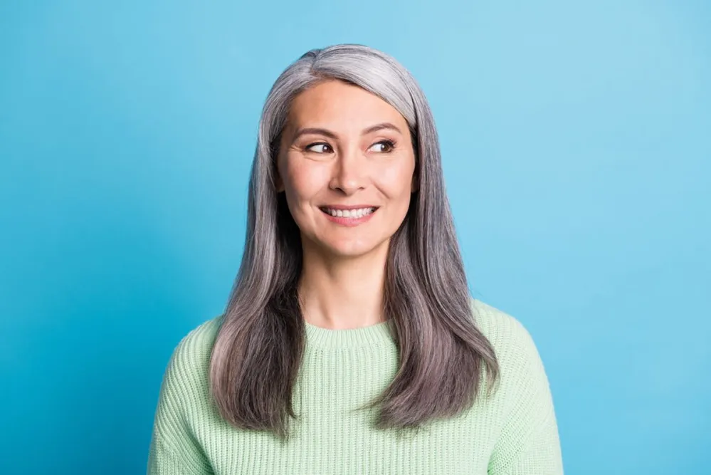 Portrait,Of,Beautiful,Smiling,Mature,Woman,Dressed,Green,Pullover,Isolated