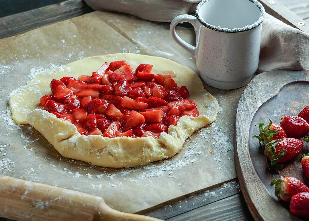 Galette,With,Fresh,Strawberry,Process,Of,Preparation,,Young,Woman,Hands,