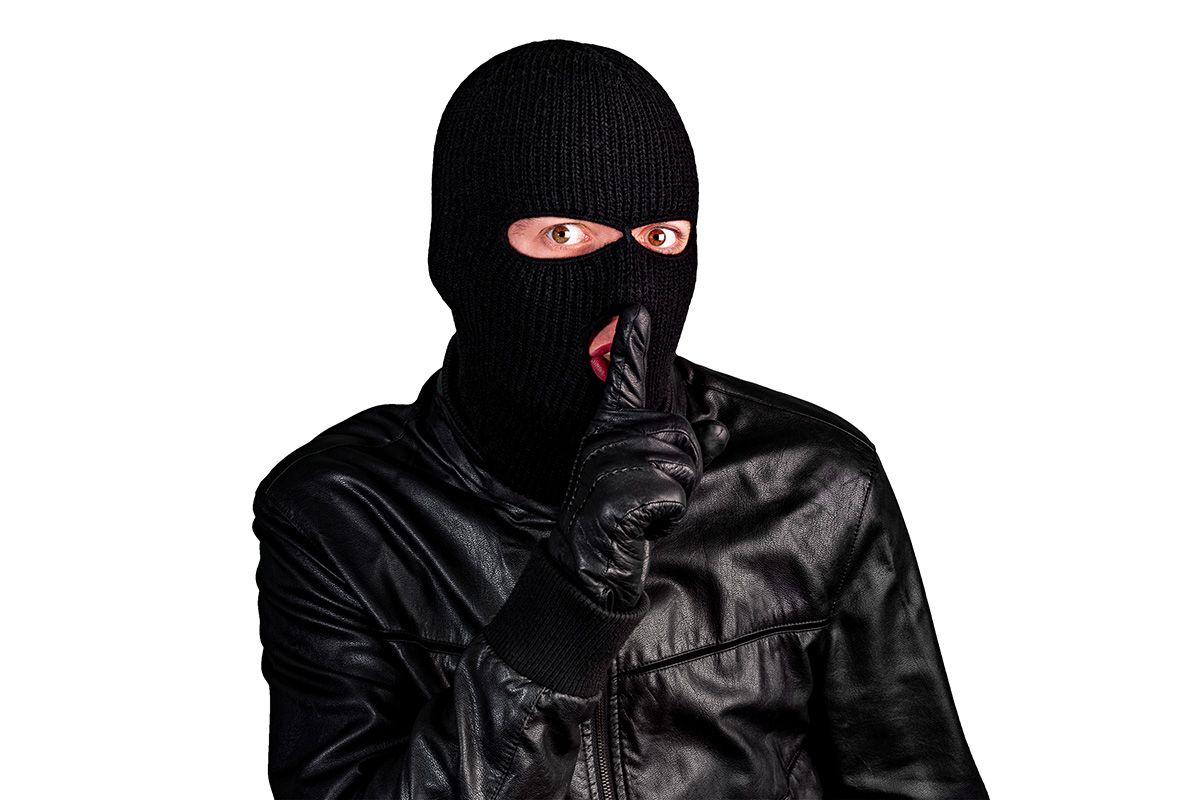 Thief,In,A,Mask,Showing,Sign,Quieter,,Isolated,On,A