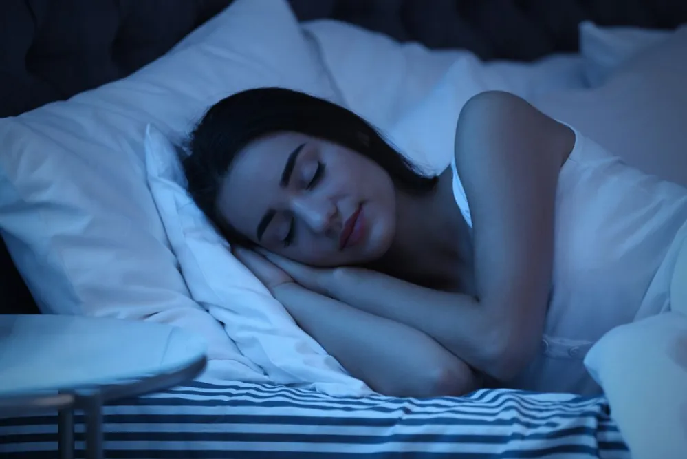 Young,Woman,Sleeping,In,Bed,At,Night.,Sleeping,Time
