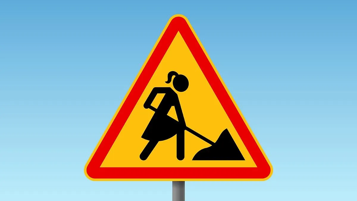 Road,Works,Traffic,Sign,With,Stylized,Woman,Figure,Wearing,Dress,