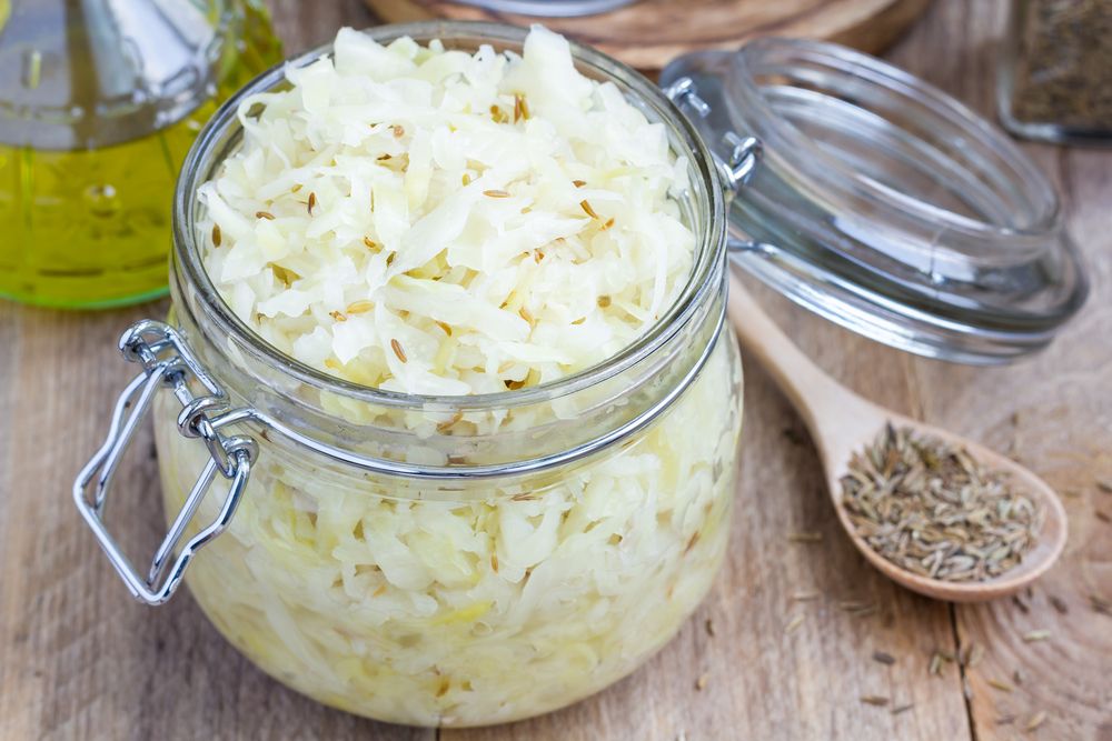 Homemade,Sauerkraut,With,Cumin,In,A,Glass,Jar