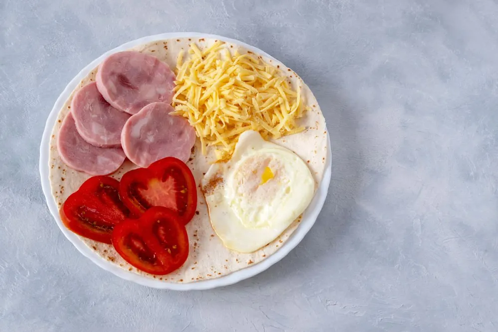 Tortillas,With,Various,Fillings,Of,Ham,,Cheese,,Fried,Eggs,On
