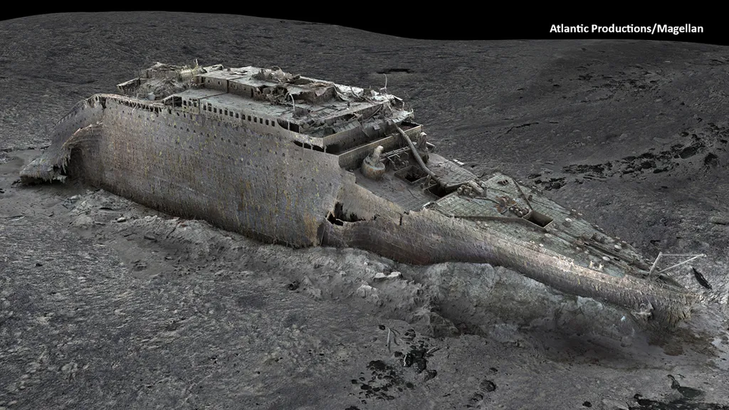 A grab taken from a digital scan released by Atlantic/Magellan on May 19, 2023 shows a view of the Titanic in the Atlantic Ocean created using deep-sea mapping. The first full-sized 3D scan of the Titanic shipwreck may reveal more details about the ocean liner's fateful journey across the Atlantic more than a century ago. The high-resolution images reconstruct the wreck that lies at a depth of nearly 4,000 metres (13,100 feet) in great detail and were created using deep-sea mapping. (Photo by Handout / Atlantic/Magellan / AFP) / RESTRICTED TO EDITORIAL USE - MANDATORY CREDIT "AFP PHOTO / ATLANTIC / MAGELLAN" - NO MARKETING - NO ADVERTISING CAMPAIGNS - DISTRIBUTED AS A SERVICE TO CLIENTS - NO RESALE - TO BE USED SOLELY IN CONTEXT OF STORY ABOUT RMS TITANIC SCANS - MANDATORY ONSCREEN CREDIT: ATLANTIC / MAGELLAN - MANDATORY CREDIT ON SOCIAL MEDIA PLATFORMS: Instagram: @atlantic.productions/ Twitter: @atlanticprods /