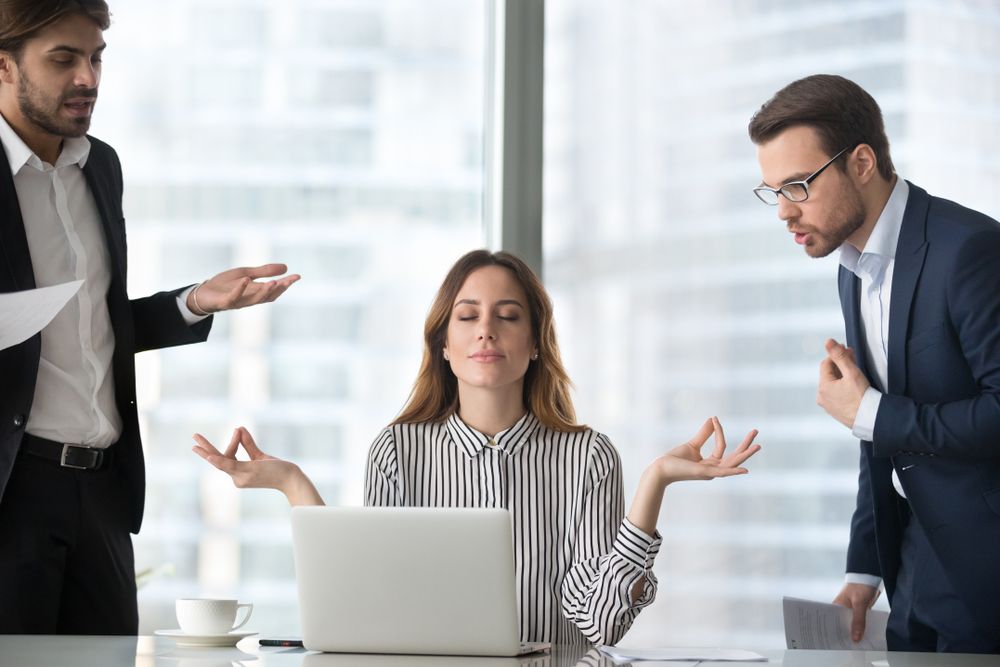 Calm,Female,Worker,Meditate,At,Workplace,Managing,Stress,Not,Paying