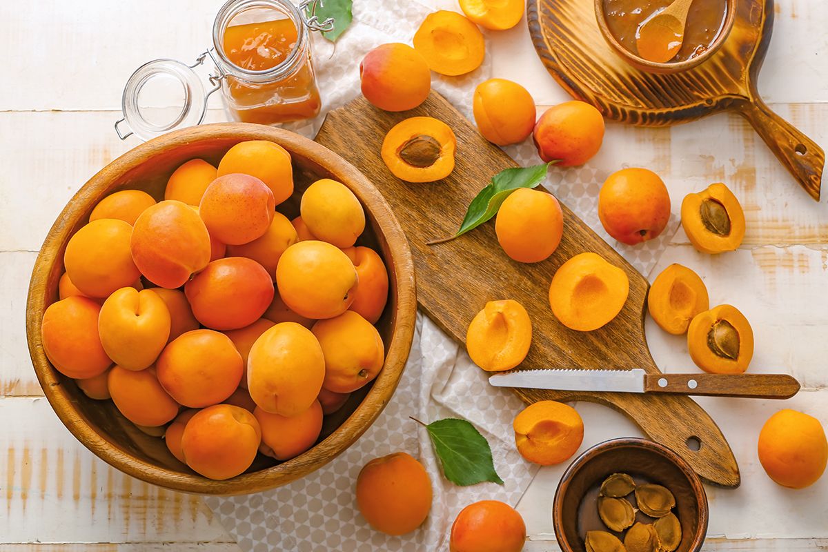 Tasty,Ripe,Apricots,With,Jam,On,Table