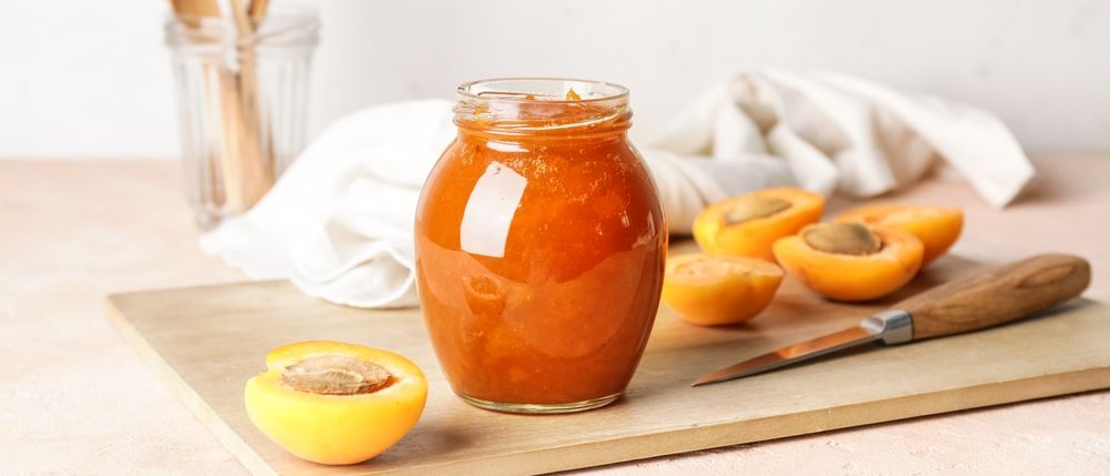 Jar,Of,Tasty,Apricot,Jam,On,Table