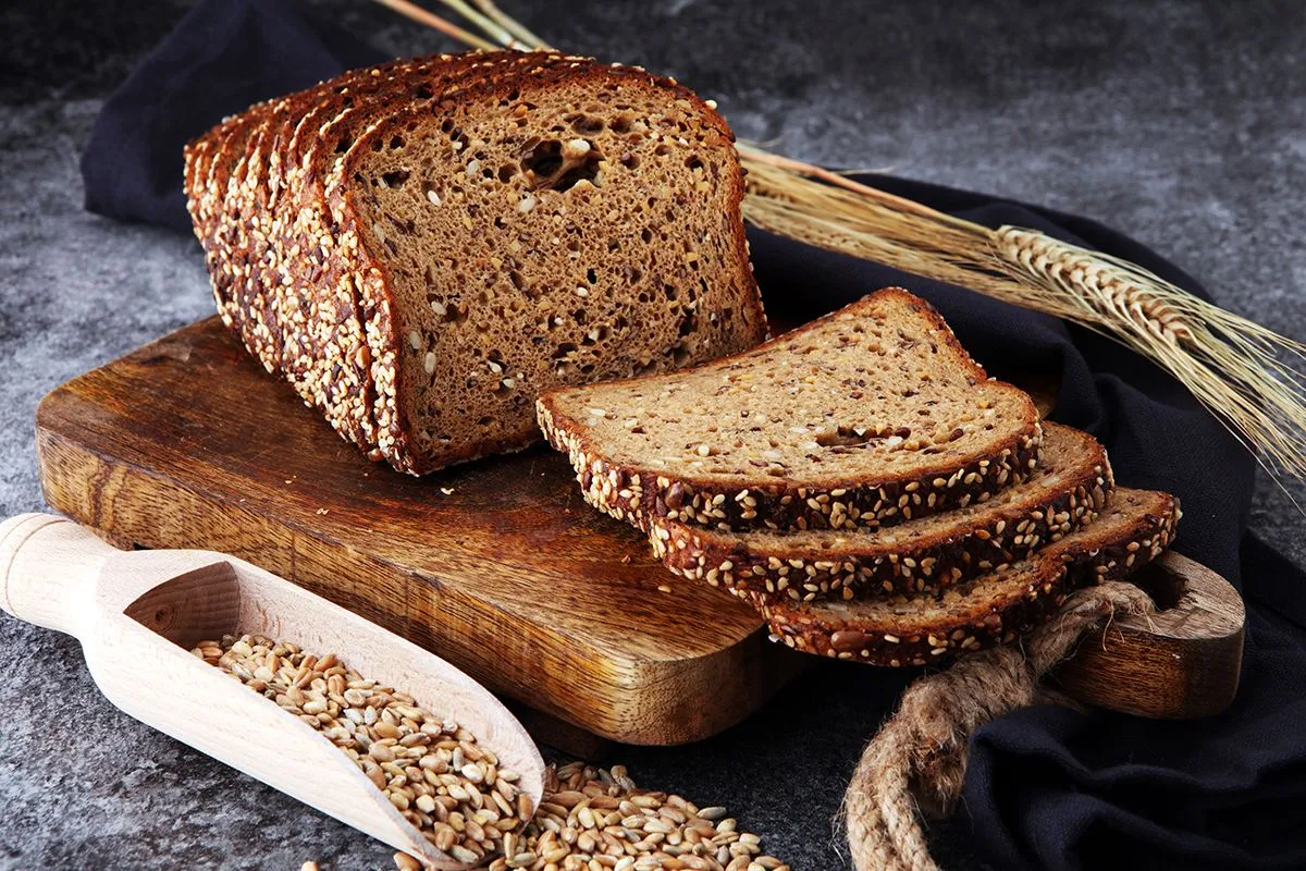 Sliced,Rye,Bread,On,Cutting,Board.,Whole,Grain,Rye,Bread