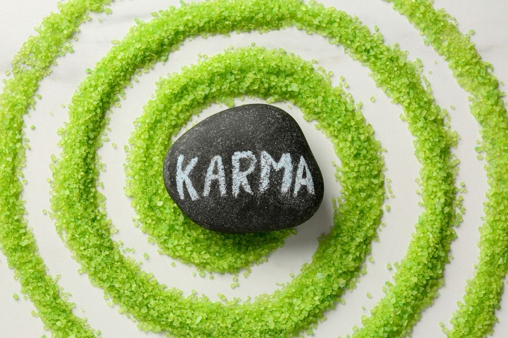 Stone,With,Word,Karma,And,Circle,Made,Of,Light,Green