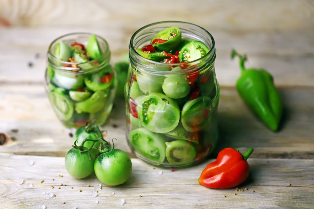 Selective,Focus.,Jars,Of,Salted,Green,Tomatoes.,Fermentation,Of,Green