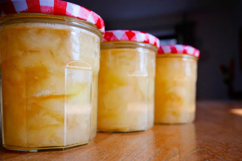 Home,Made,Apple,Compote,In,Three,Colorful,Glasses