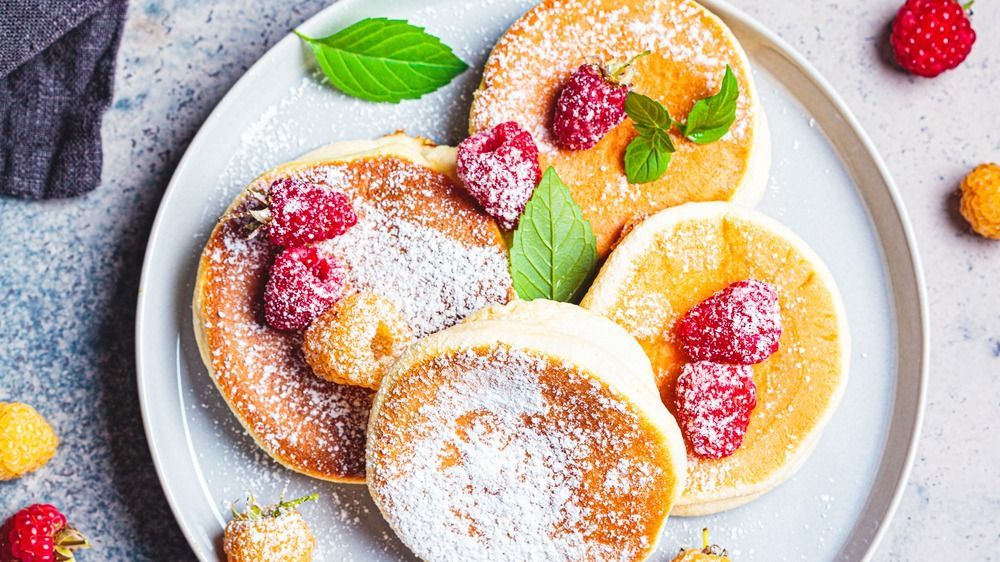 Japanese,Fluffy,Pancakes,With,Raspberries,In,A,Gray,Plate,,Gray