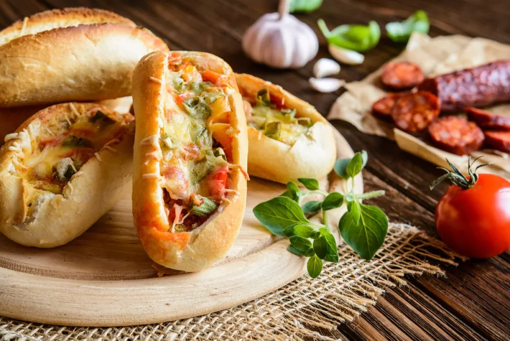 Bread,Boats,Stuffed,With,Sausage,,Egg,And,Cheese,For,Breakfast