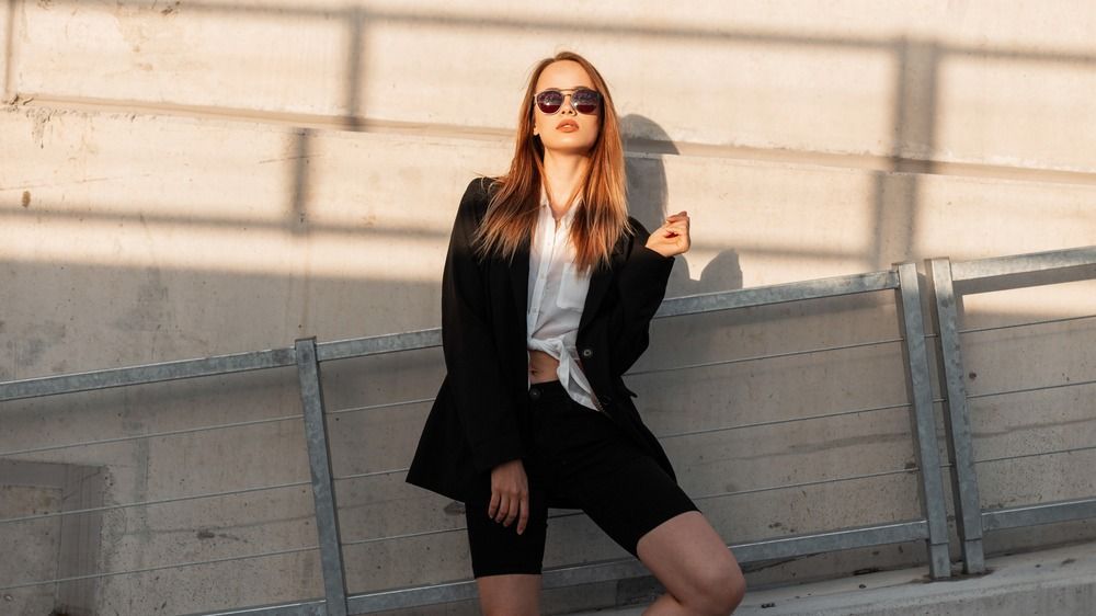 Fashionable,Young,Woman,In,Sunglasses,In,Black,Stylish,Blazer,In