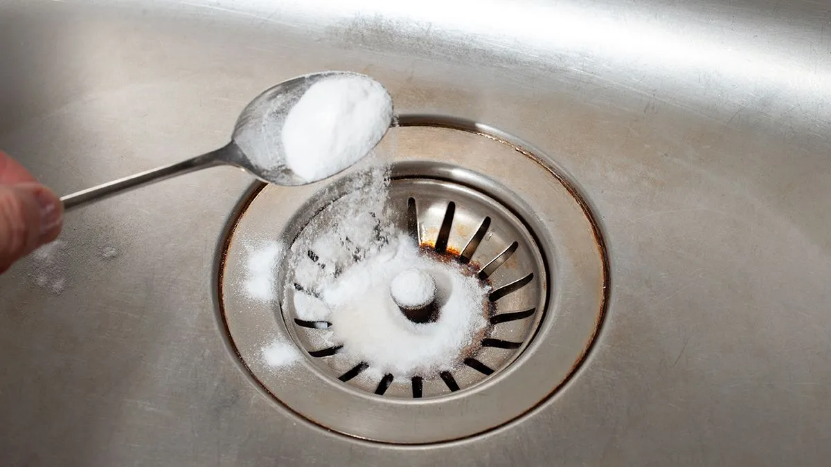 A,Spoonful,Of,Baking,Soda,In,His,Hand,Pours,Onto