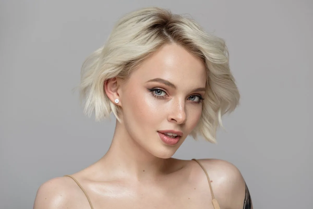 Portrait,Of,A,Beautiful,Blonde,Girl,With,A,Short,Haircut.