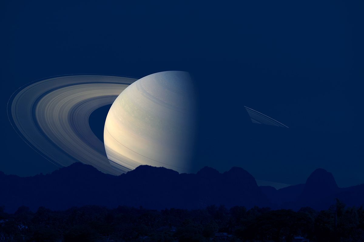 Saturn,Back,Silhouette,Mountain,On,Cloud,And,Night,Sky,,Elements
