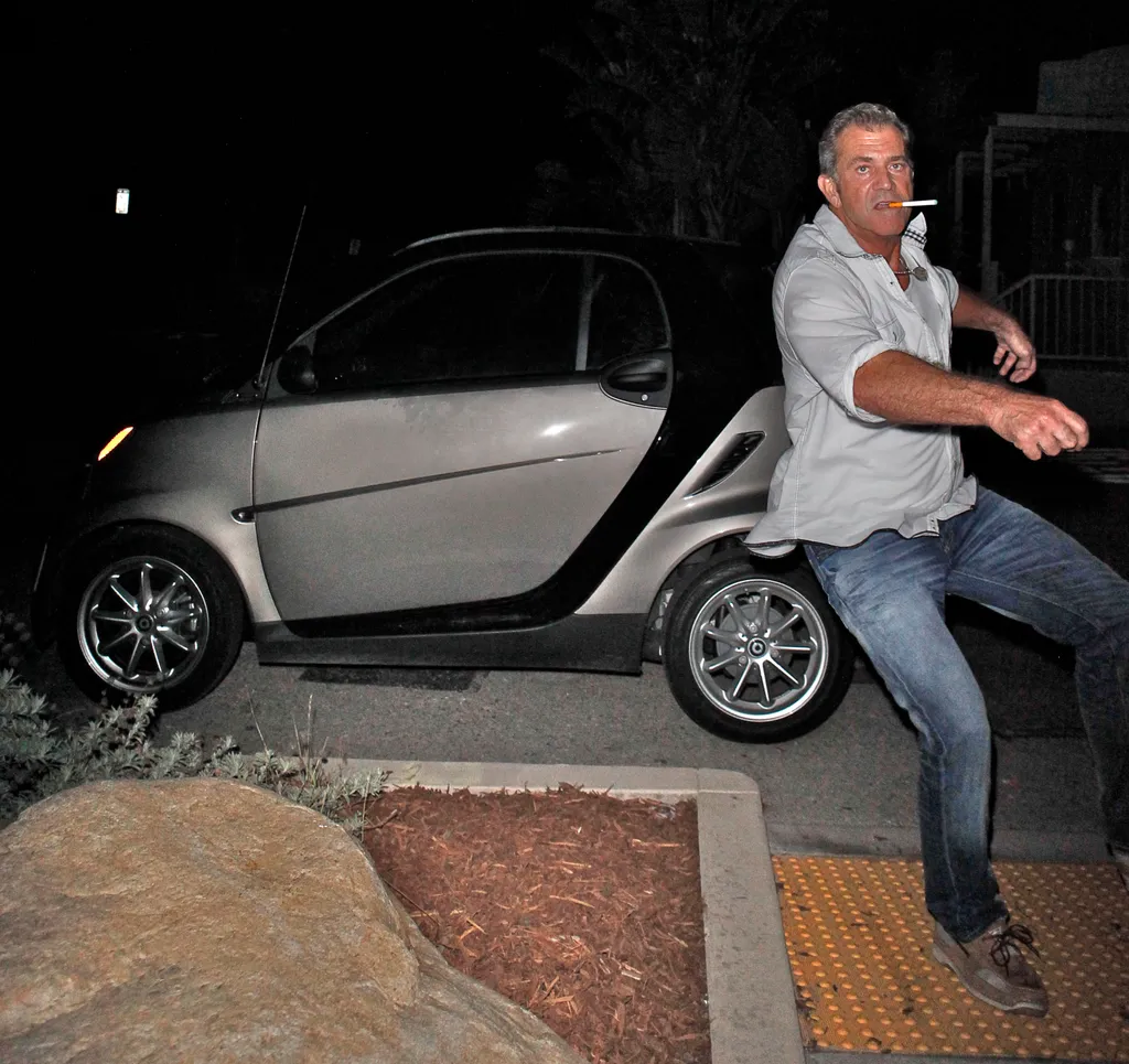 Stumbling Mel Gibson gets angry when phographed while leaving Taverna Tony restauranrt in Malibu CA