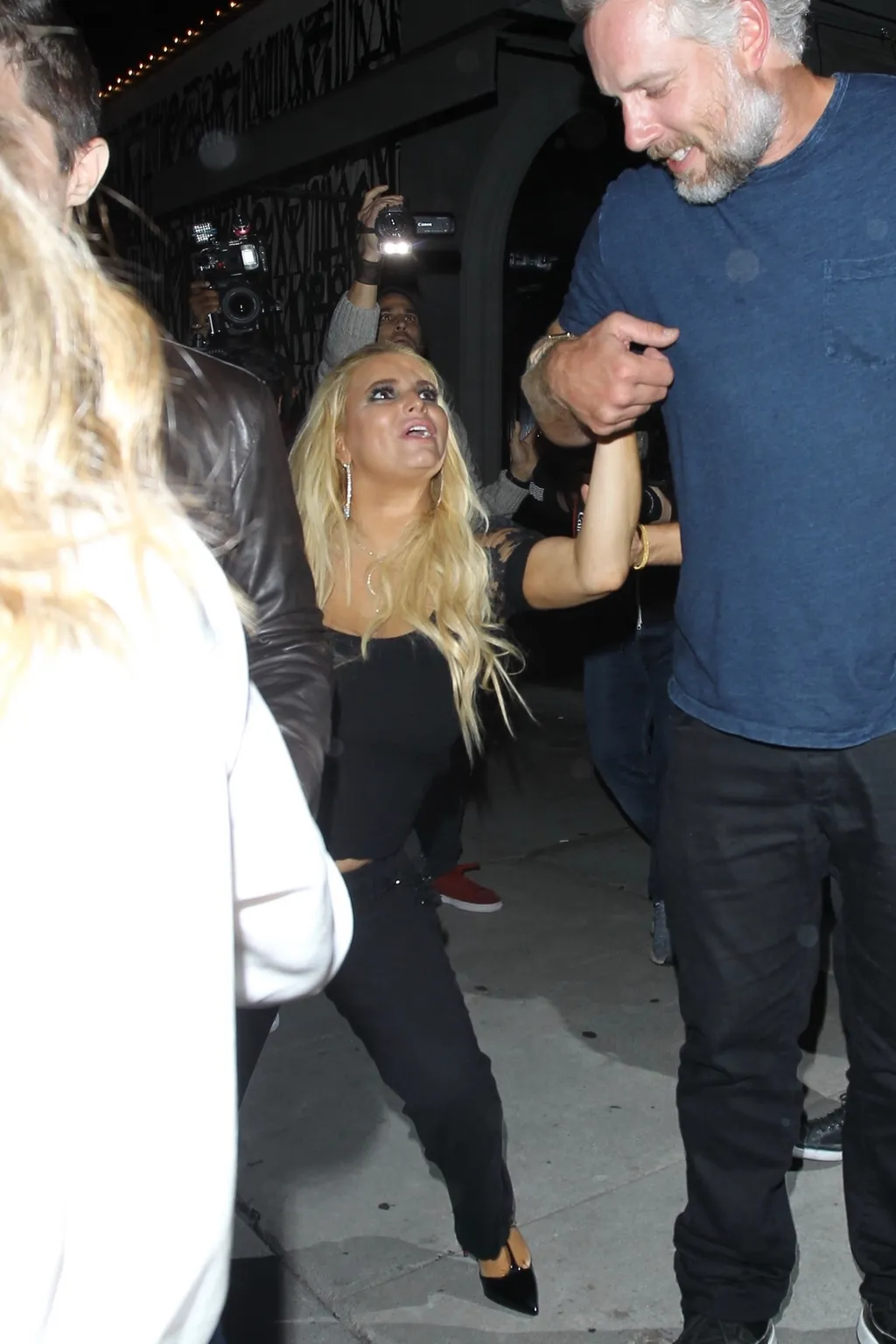 A worse for wear Jessica Simpson leaves Craig's restaurant