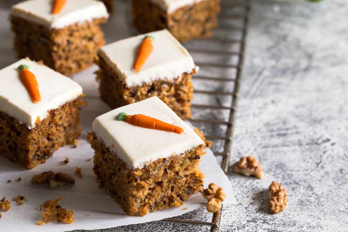 Pieces,Of,Carrot,Cake,With,Walnuts,With,Icing,Cream,On