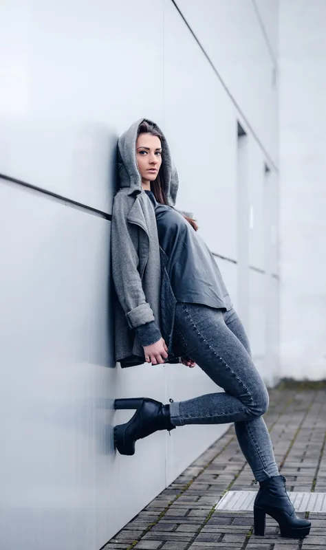 Young,Woman,With,Long,Hair,,With,A,Leather,Backpack,,A